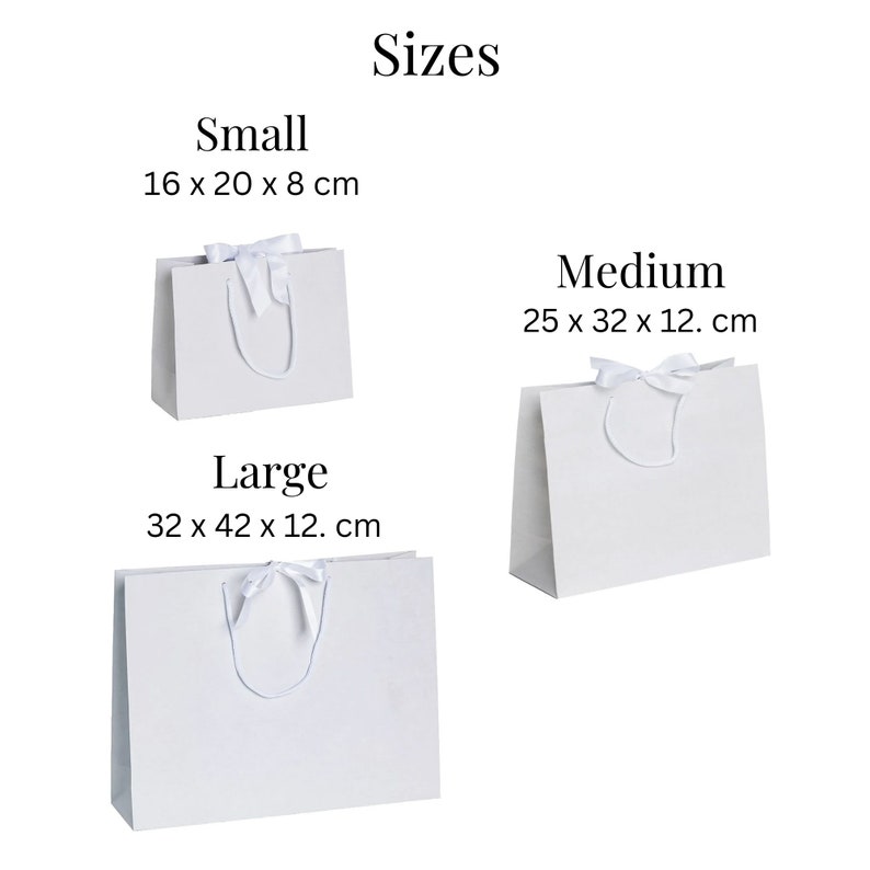 May include: Three white gift bags with white satin ribbon bows and handles. The bags are labeled "Small" (16 x 20 x 8 cm), "Medium" (25 x 32 x 12 cm), and "Large" (32 x 42 x 12 cm).