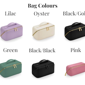 May include: Six different colored cosmetic bags with gold zippers and handles. The colors are lilac, oyster, black/gold, green, black/black, and pink.
