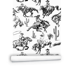 May include: Black and white illustration of cowboys riding horses. The illustration is repeated to create a seamless pattern. The pattern includes cacti.
