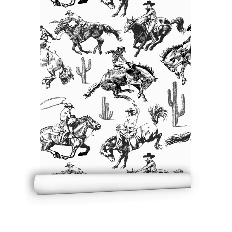 May include: Black and white illustration of cowboys riding horses. The illustration is repeated to create a seamless pattern. The pattern includes cacti.