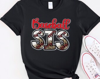 May include: Black t-shirt with the text "Baseball Sis" in red and white lettering. The letters are decorated with a baseball and leopard print design.