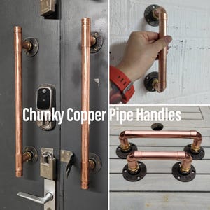 May include: Two copper pipe door handles with black flanges fitted to a dark grey door. The handles are 30 cm long. The text "Chunky Copper Pipe Handles" is visible below the handles. Three additional copper pipe handles with black flanges are shown on a wooden surface.