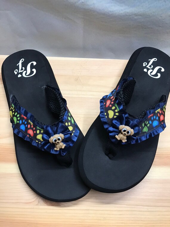 rainbow of paws flip flops