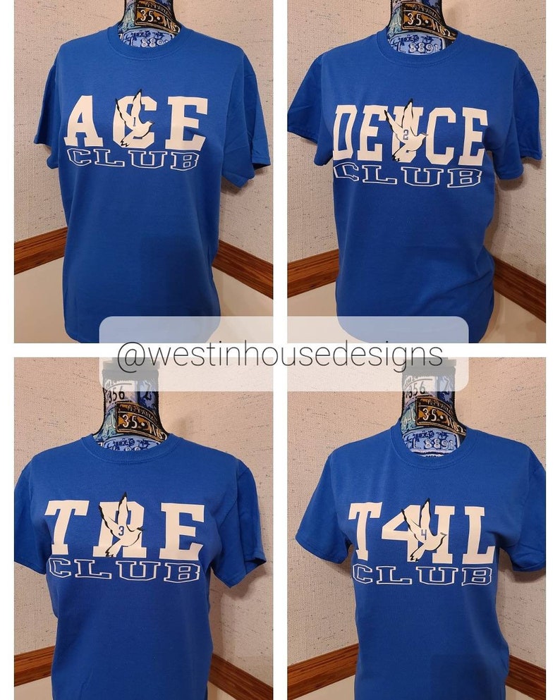 May include: Four blue t-shirts with white text and a white bird graphic. The shirts are labeled "ACE CLUB", "DEUCE CLUB", "TRE CLUB", and "T4IL CLUB".