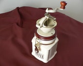 Vintage Herman Dodge sons manual coffee grinder.Manual ceramic, iron,wood and brass adjustable burr grinder.London pottery coffee grinder