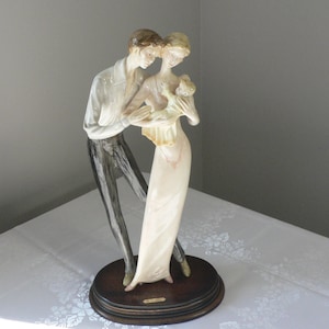Huge figurine A. Santini sculpture Couple With Baby resin alabaster.Signed, about 43 cm tall  Italian statue on oval wooden base.