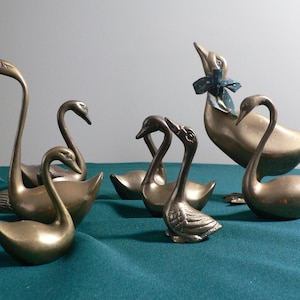 Retro collectible water fowl figurines with lovely patina.Vintage solid brass ducks swans geese figurines set of 9.Brass birds home decor.