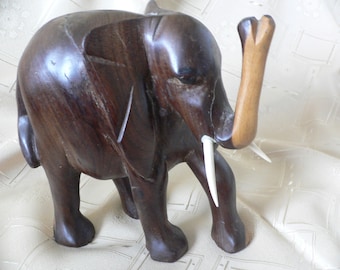 Vintage Hand Carved Wooden Elephant Sculpture: Retro Art Figurine