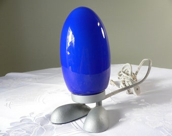 Vintage Fjorton Dino Egg lamp with feet design by Tatsuo Konno. Retro navy blue table children's lamp Scandinavian modern design.