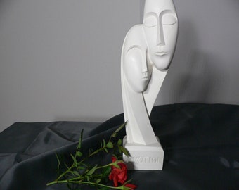 Escultura griega antigua de alabastro: figura cicládica de dos cabezas hecha a mano