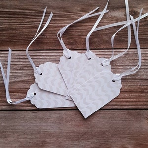 24 white cardstock gift tags