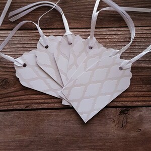 24 white cardstock gift tags