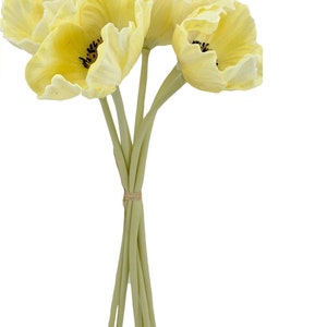 May include: A bouquet of four yellow silk poppy flowers with green stems tied together with a brown band.