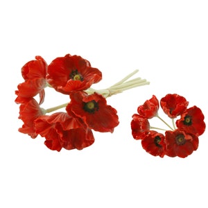 May include: A bouquet of red artificial poppy flowers with green stems. The flowers are arranged in a cluster and are ready to be used in a craft project.