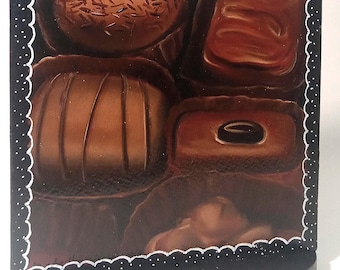 Lámina artística de chocolates sobre soporte