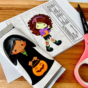 May include: A printable Halloween treat bag design featuring a witch with black hair and a black cape holding a pumpkin. The design is printed on a white background with a spiderweb pattern.