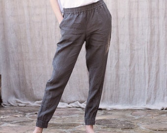 Linen ladies long pants with elastic on the legs. Women linen trousers with wide elastic waistband and pockets