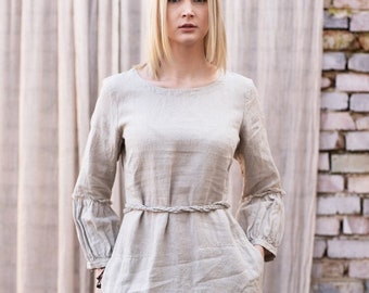 Linen knee dress with puffy sleeves. Rough edges boho dress with boat neckline and pockets. Colours