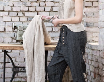 Ladies baggy linen pants/trousers with button fly and side pockets. Loose pants with elastic waistband. Colors
