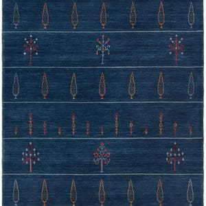 Top-down view of dark blue wool gabbeh rug 8x10, navy base with spaced tribal motifs