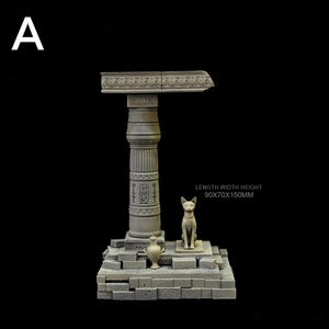 May include: A gray, miniature Egyptian-style sculpture featuring a column, a cat statue, and a small vase. The sculpture is on a rectangular base. The text on the image reads: LENGTH WIDTH HEIGHT 90x70x150mm.