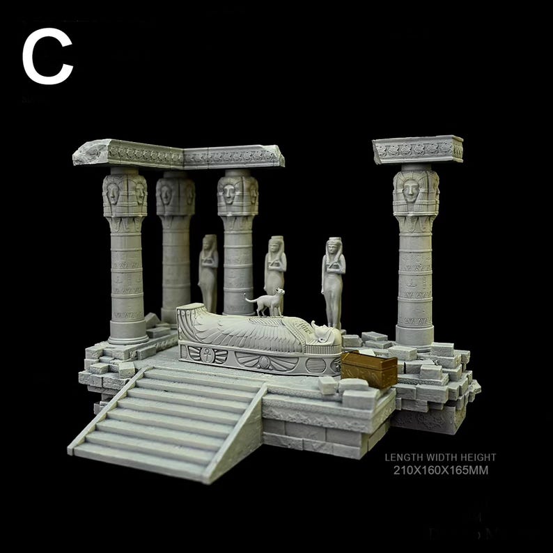 May include: A gray miniature Egyptian temple diorama with columns, statues, and a sarcophagus. The model includes a staircase leading to the sarcophagus, and a small chest. The dimensions are 210mm long, 160mm wide, and 165mm high.