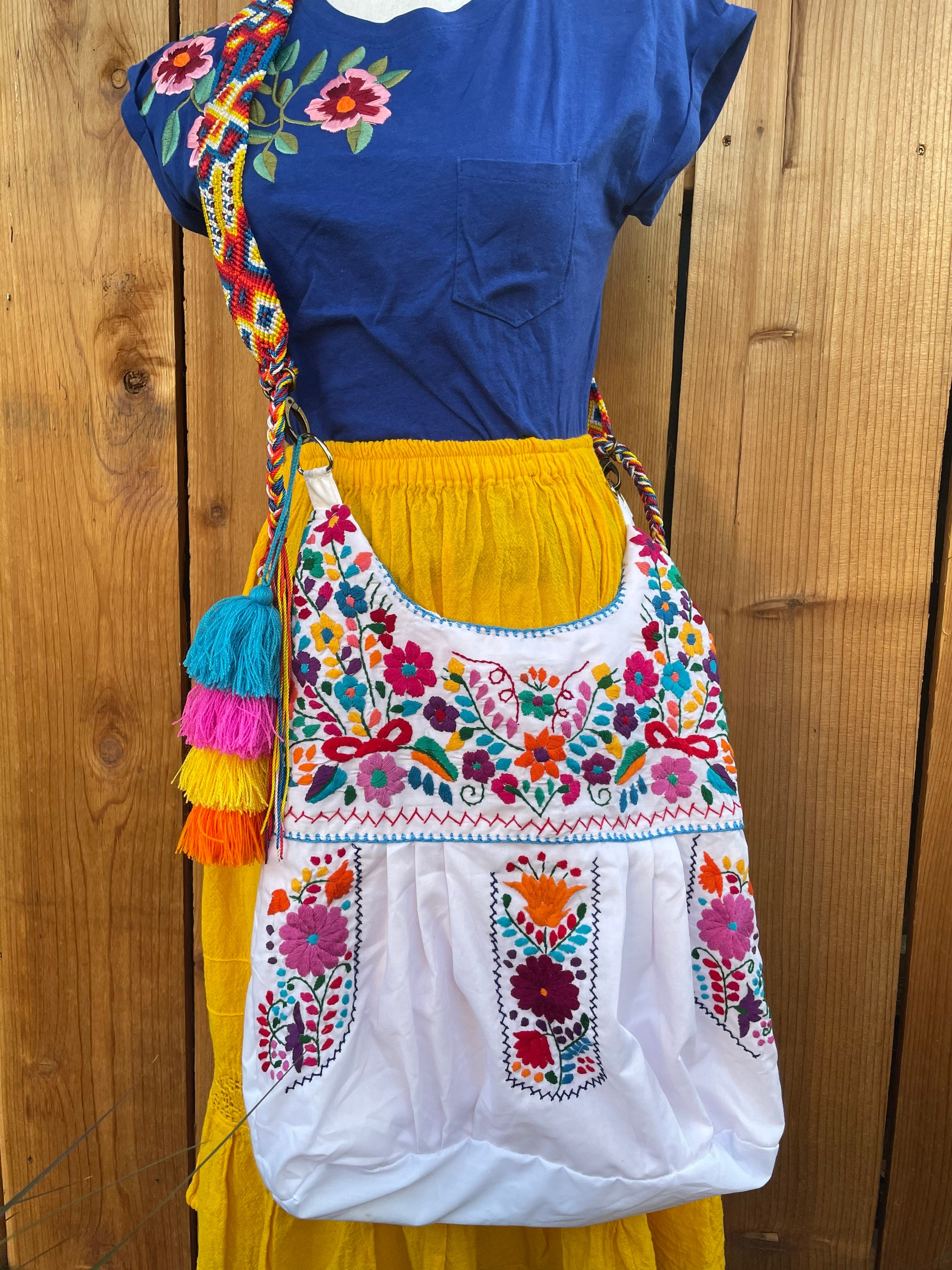 Mexican hand embroidered bag with hand woven strap pompom tassels included