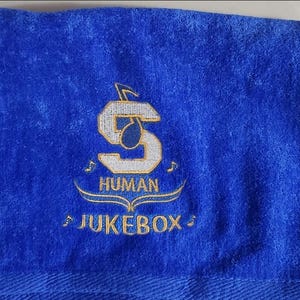 Embroidered Southern University Jukebox rally towel.