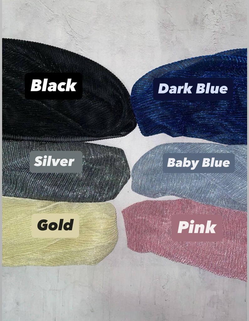six different colored yarn balls, each labeled with a color name: Black, Dark Blue, Silver, Baby Blue, Gold, and Pink.