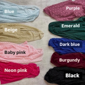 a collection of colorful fabric swatches, each with a label indicating the color and pattern.