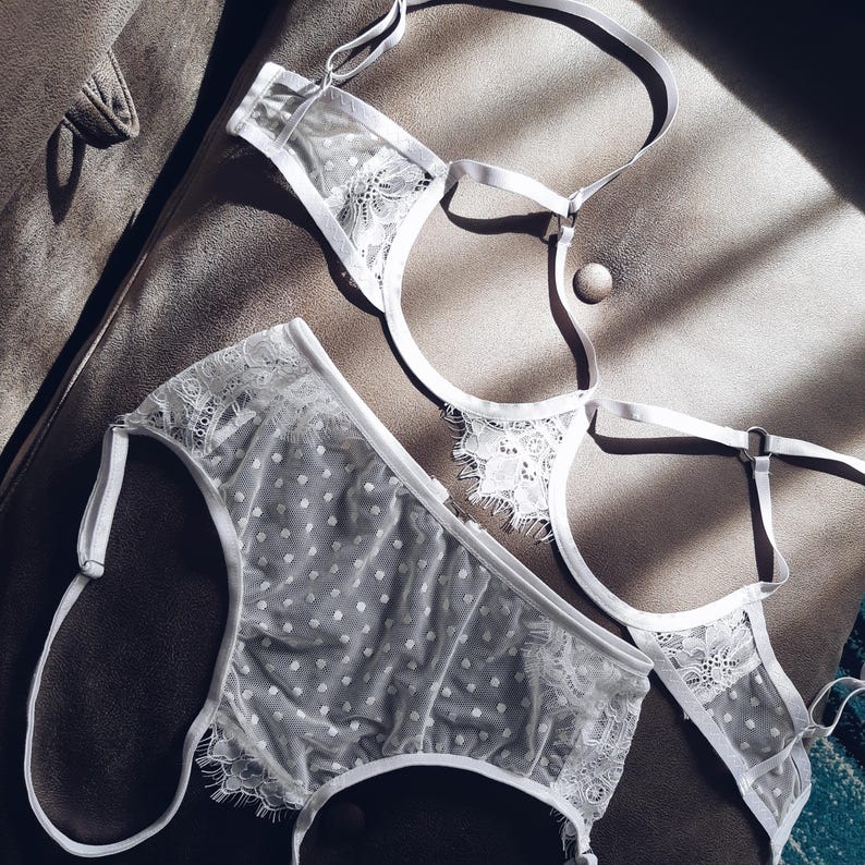 a pair of underwear sitting on top of a bed