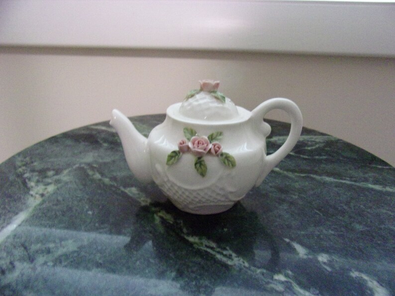 Unique Porcelain Miniature Teapot With Floral Design