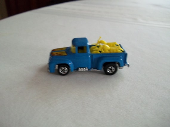 hot wheels 1973 blue truck with motorcycles