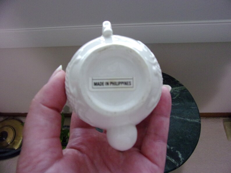 Unique Porcelain Miniature Teapot With Floral Design