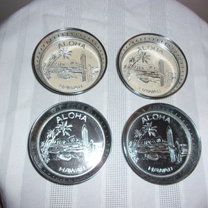 Vintage Set Of Four Metal Hawaii Coasters Two Black And Two Beige Hawaii Coasters