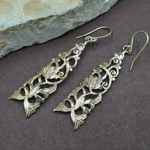 Long ornate earrings. Antique earrings
