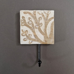 Carved wooden hanger. Mango wood.