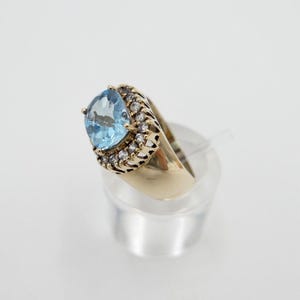Ladies' gold ring 375 9K 4.70 ct with large blue topaz & zirconia size 54