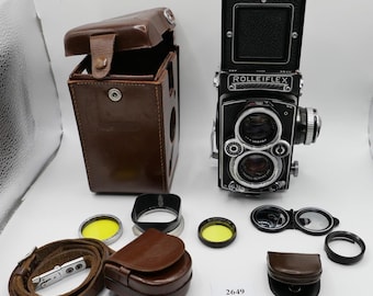 Rolleiflex SL35M with Rollei Planar 50mm f/1.8. The real gem of