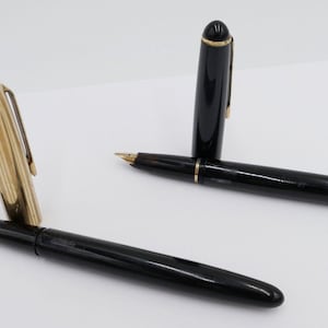 Set van 2 vintage LAMY zuigervulpennen, model 27 585 / 14 karaat gouden penpunt
