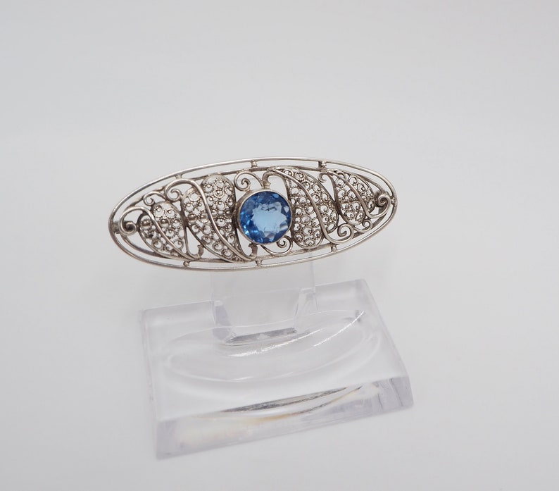 Filigree brooch deals