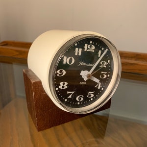 Vintage Wood Base Cylindrical Homestead Brand alarm Clock 4”x4”