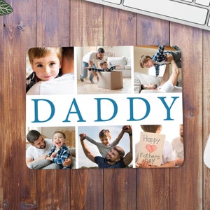 May include: A collage of photos featuring a father and his children. The photos are arranged in a grid with the word "DADDY" in large blue letters across the middle. One photo shows a child holding a sign that says "Happy Father's Day".