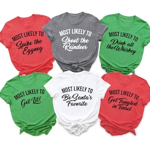 May include: Six Christmas-themed t-shirts with the text "Most Likely To" followed by a funny holiday-related phrase. The shirts are in red, green, white, and gray.