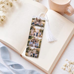 May include: A rectangular bookmark featuring four stacked photographic panels of a family in an outdoor setting. The bookmark is made of a smooth material with rounded corners and includes a white braided cord attached to a white fabric tassel.
