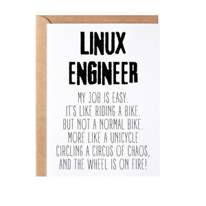 May include: A white card with black text that reads "LINUX ENGINEER MY JOB IS EASY. IT'S LIKE RIDING A BIKE. BUT NOT A NORMAL BIKE. MORE LIKE A UNICYCLE CIRCLING A CIRCUS OF CHAOS, AND THE WHEEL IS ON FIRE!"