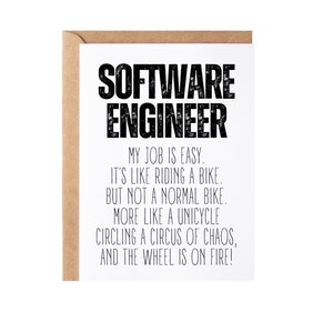 May include: A white card with black text that reads "SOFTWARE ENGINEER" and a humorous description of the job: "MY JOB IS EASY. IT'S LIKE RIDING A BIKE. BUT NOT A NORMAL BIKE. MORE LIKE A UNICYCLE CIRCLING A CIRCUS OF CHAOS, AND THE WHEEL IS ON FIRE!"