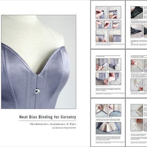Op de afbeelding: Een close-up van een grijs satijnen corset met een V-hals. De tekst "Neat Bias Binding for Corsetry" is zichtbaar onderaan de afbeelding. De tekst "Techniques, Materials & Tips" is ook zichtbaar, samen met de naam van de auteur, "Barbara Pesendorfer".