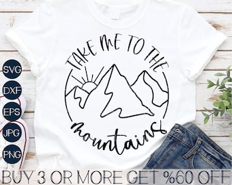 May include: A white t-shirt with a black graphic design that says "Take me to the mountains" with a stylised image of mountains and a sun. The text "BUY 3 OR MORE GET %60 OFF" is at the bottom of the image.
