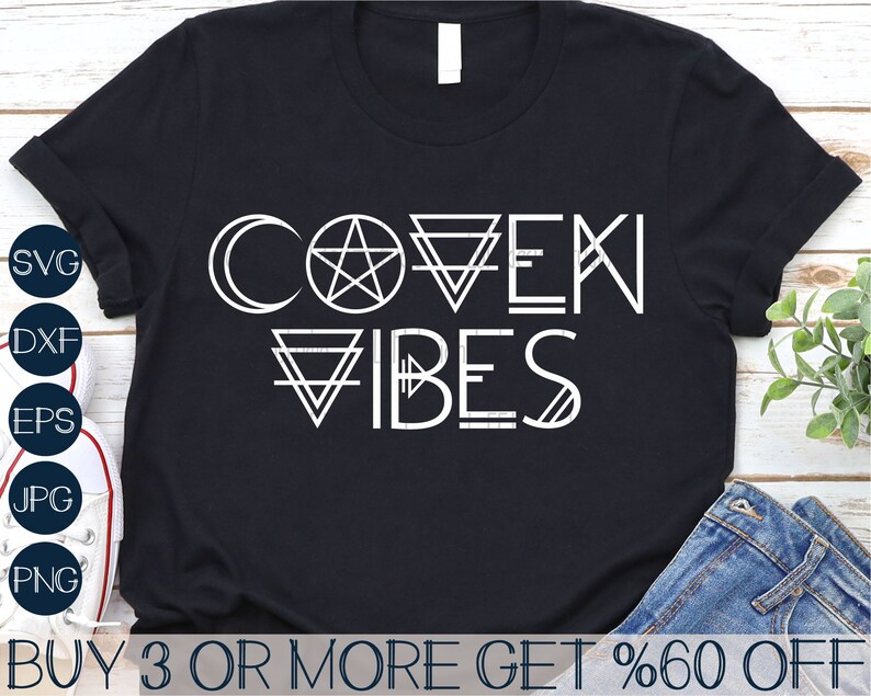 May include: Black t-shirt with white text that reads "COVEN VIBES" with a crescent moon, pentagram, and triangle symbols.